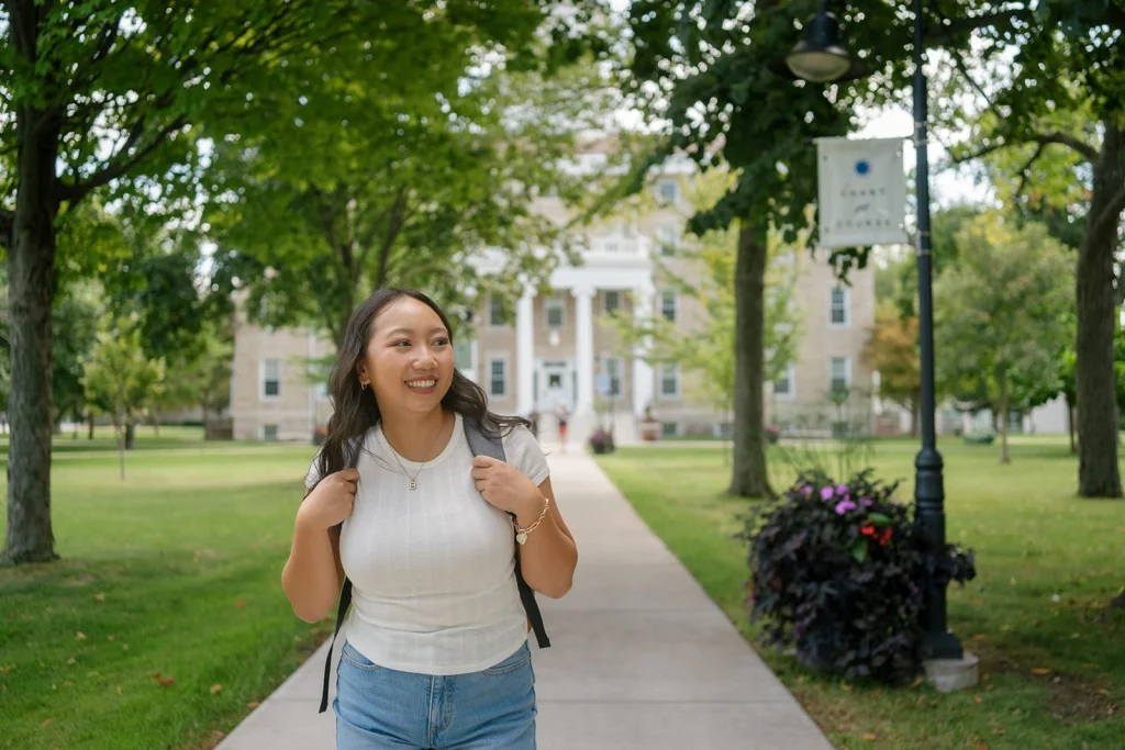 A student looks across a college campus.